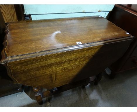 A Polished Oak Gate Leg Table