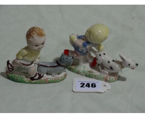 A Pair Of Wade Porcelain Mabel Lucie Attwell Figures, "Sam & Sarah"