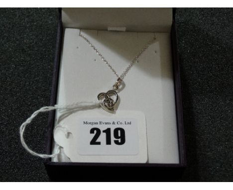 A Silver Celtic Heart Pendant On Chain