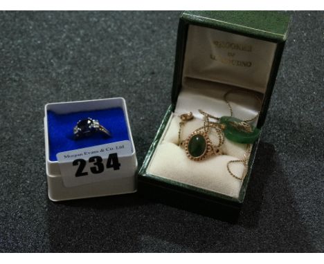 A Jade Heart Shaped Pendant And Chain Together With A Similar Ring And A Further Dress Ring