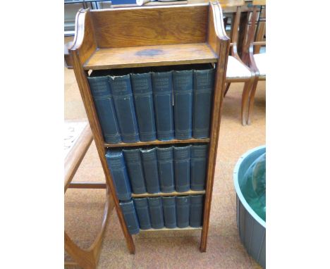 18 Volumes of early Charles Dicken's books in a oak book shelf