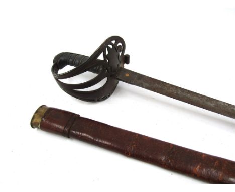 A Victorian 1854 pattern Coldstream Guards officer's sword, the engraved Henry Wilkinson blade joining a pierced hilt with Co