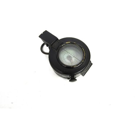 A WWII British army matching compass Mk. III by T.G. Co. Ltd., of London, S/N 207820, dated 1943