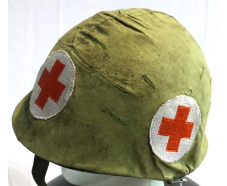 Vietnam War period US M1 helmet with ARVN Medics cover. P&amp;P Group 2 (£18+VAT for the first lot and £3+VAT for subsequent 