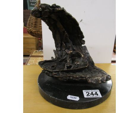 Bronze sculpture of boat on wave on marble base (Mast missing)