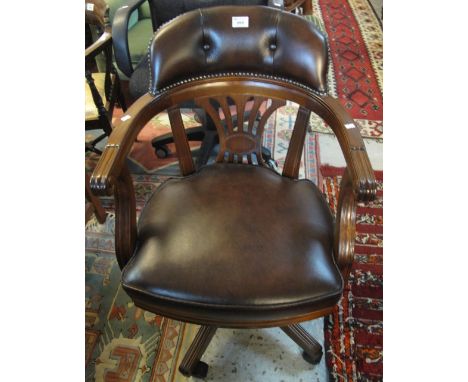 Reproduction leather button back office or director's swivel armchair. (B.P. 24% incl. VAT)   CONDITION REPORT:  Swivels and 