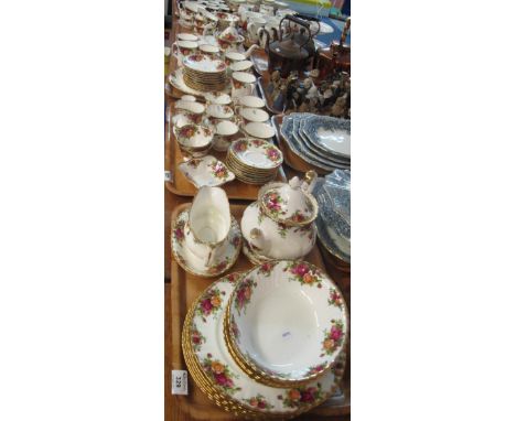 Four trays of Royal Albert 'Old Country Roses' bone china teaware comprising: two teapots, cups, saucers, bowls, egg cups, sa