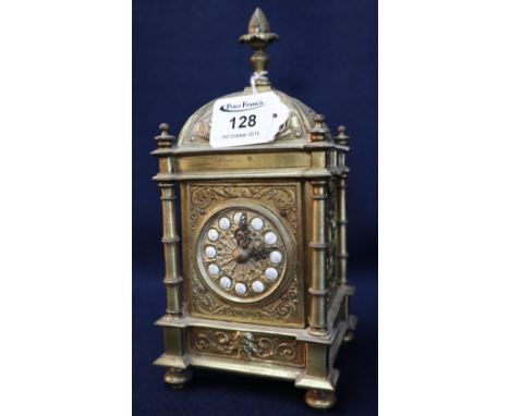 19th Century brass lantern shaped bracket clock with relief classical mask decoration and ceramic numerals, carriage clock ty