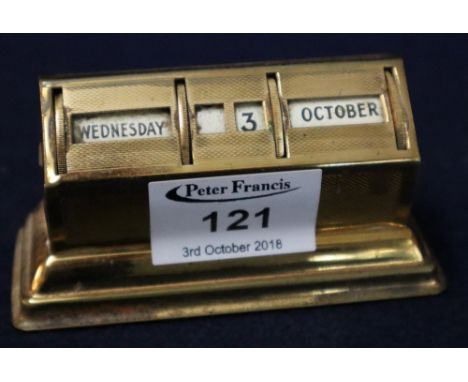 Brass desk calendar with engine turned finish and loaded base. (B.P. 24% incl. VAT)