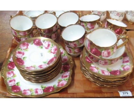 Forty piece Royal Albert Crown china rose design tea service. (B.P. 24% incl. VAT)   CONDITION REPORT:  No obvious damage.