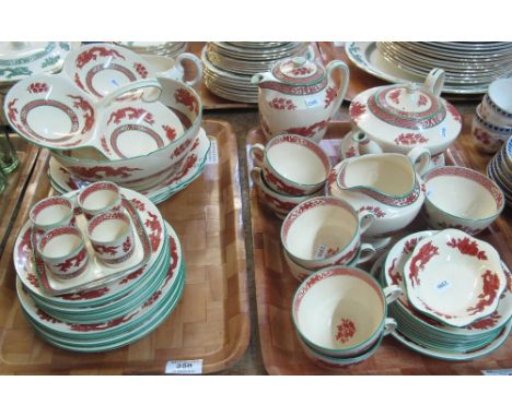 Two trays of Royal Cauldon dragon design teaware, various to include: teacups and saucers, teapot on stand, water jug, horder