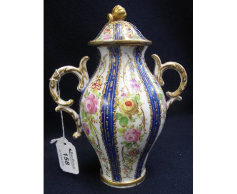 Continental porcelain two handled ovoid shaped vase with floral decoration and cover, unmarked possibly Sampson. (B.P. 24% in
