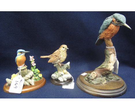 Three ceramic birds on wooden bases to include: two kingfishers and another. (3)(B.P. 24% incl. VAT)