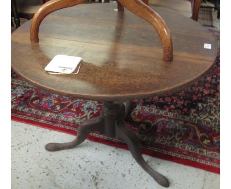 19th Century oak circular tilt top tripod table. (B.P. 24% incl. VAT)   CONDITION REPORT:  Poor condition, splits and losses.