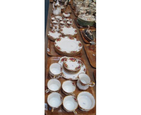 Three trays of Royal Albert bone china 'Country Roses' teaware, various to include: cups, saucers, teapot, plates, milk jug, 