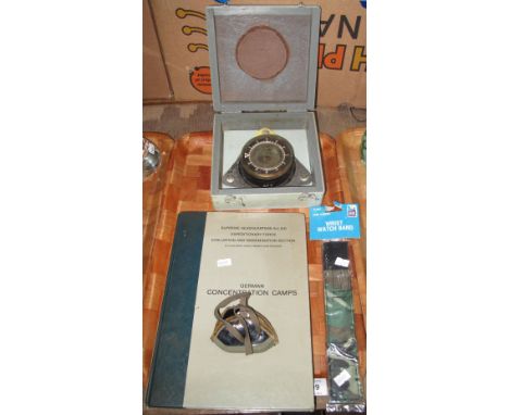 Military card compass in fitted box, together with tinted goggles, modern wristwatch and single volume German Concentration C