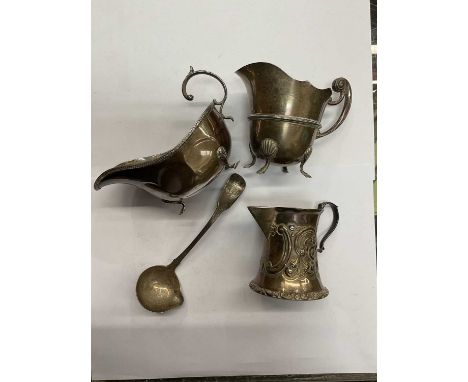 Two Edwardian silver cream jugs and a George IV Irish silver cream ladle (Dublin 1823) a silver sauce boat