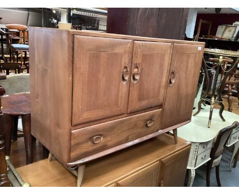 Ercol sideboard with three cupboards and single drawer  (handles broken), 113cm wide, 42cm deep, 82cm high