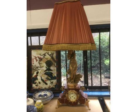 Early 20th century Continental clock / lamp, with gilt figural surmount titled Primas, the marble base centred by circular en