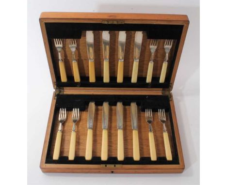 1930s composite canteen of 12 pairs fish eaters, with silver blades and ivory handles, in a fitted Oak case. (Sheffield 1937 