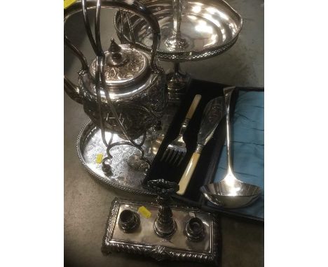 Silver plate including a kettle on stand, epergne, desk stand, tray, ladle and cased fish servers