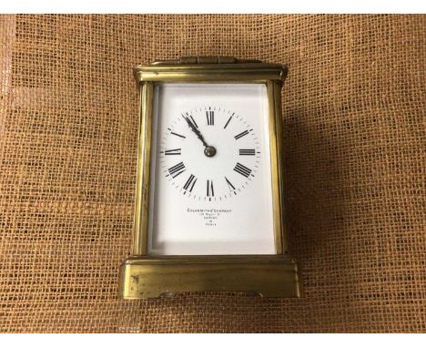 Goldsmiths' &amp; Company brass carriage clock and key