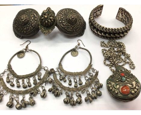 19th century Turkish white metal buckle, Eastern white metal scent flask on chain, pair Eastern earrings and white metal torq