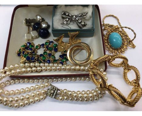 Small group of costume jewellery including silver paste set bow brooch and a German gold plated bracelet etc