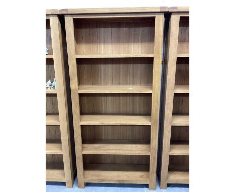 Pair of light oak open bookcases, 90cm wide, 30cm deep, 180cm high