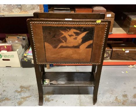 Early 20th century oak magazine rack with leather panel depicting flying geese, together with a similar leather topped oak st
