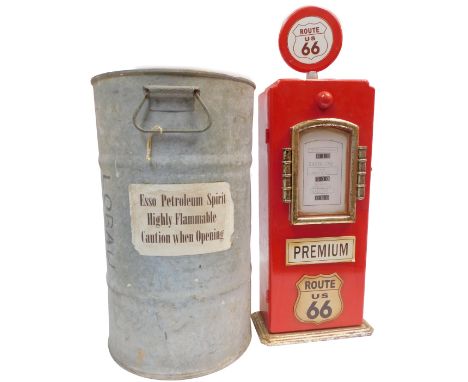 A galvanised metal petroleum can, bearing paper label for Esso Petroleum Spirit Highly Flammable Caution When Opening, 50cm h