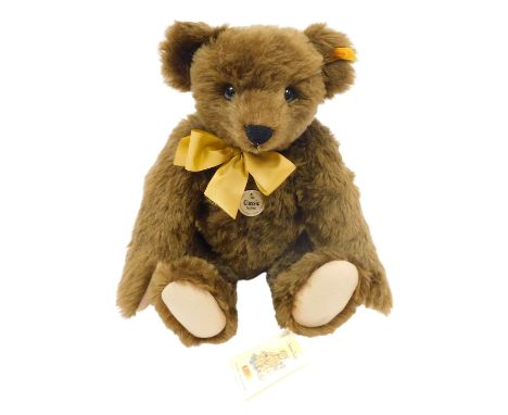 A Steiff 1909 Classic Teddy bear, mohair with growler and felt pads, 42cm.