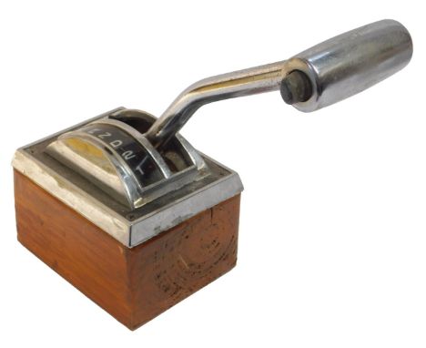 A Ford Mustang automatic transmission selector level, mounted on a wooden base.