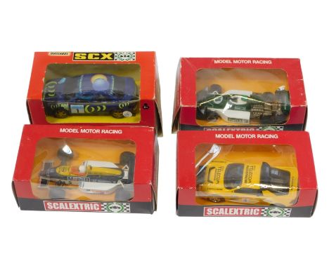 Three Scalextric racing cars, comprising March, Williams, and Ford RS200, together with a Matchbox SCS Subaru Impreza. (4)