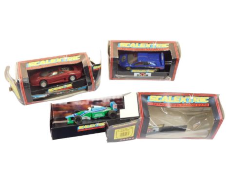 Scalextric electric model racing cars, including C230 Jaguar XJ220, C237 Ford Benetton B193 (1994), and C582 Lamborghini Diab