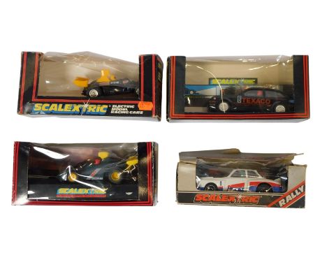 Four Scalextric racing cars, comprising C386 Stone Avionics, C455 Cosworth Texaco, C128 BMW Turbo, C215 Duckhams QXR.