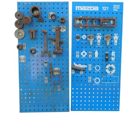 Two Mazda 121 Special Service Tools boards. 