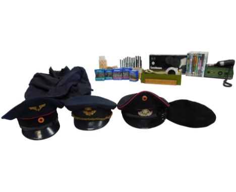 A mixed lot of auto parts, drills, DVDs, Goodmans speaker system, peaked caps, etc. 