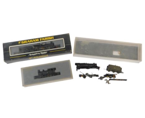 Three Graham Farish boxed trains, being Jinty 47514 BR black, Middle Crab 42932, and another. (AF)