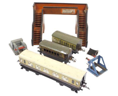 Hornby tinplate O gauge, including a GWR first and third chocolate and cream coach, a GWR first class chocolate and cream coa