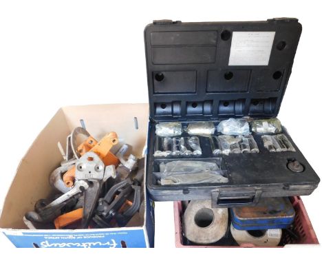 Various tools, including spanners, sockets, extraction tools, etc., and a case of shims.