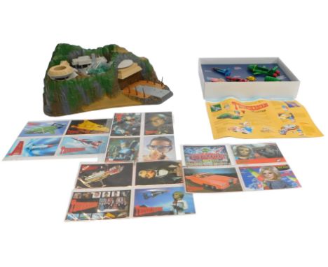 A Matchbox Thunderbirds Tracy Island, boxed, a Matchbox commemorative set The Thunderbirds Collection, and various Thunderbir