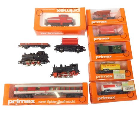 Marklin Primex locomotive and rolling stock, including 3198 diesel locomotive, 391516 Esso tanker, 4104 Speisewagen coach, et