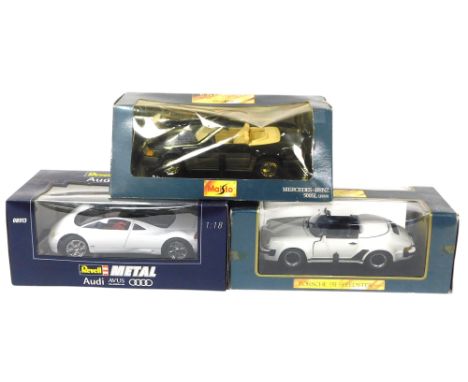 A Revell diecast Audi Avus Quattro, scale 1:18, a Master Toy Special Edition Porsche 911 Speedster (1989), scale 1:18, and a 