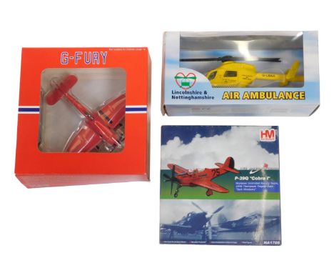 A Richmond Toys Lincolnshire and Nottinghamshire Air Ambulance, a Hobby Master P39Q Cobra-2 Sky Lanes Unlimited Racing Team 1