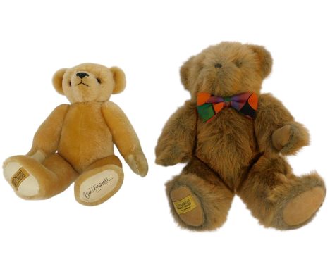 Two Merrythought bears, comprising a mohair bear with growler, 35cm high, signed by David Emanuel, and another.