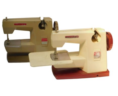 A Vulcan Countess sewing machine, in red and cream, and another Vulcan Countess manual sewing machine, in red and beige. (2)