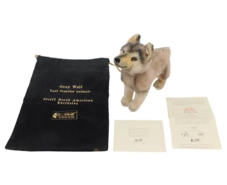 A Steiff limited edition North American Exclusive Grey Wolf, 29cm tall, number 1267/1500, with black cloth bag.