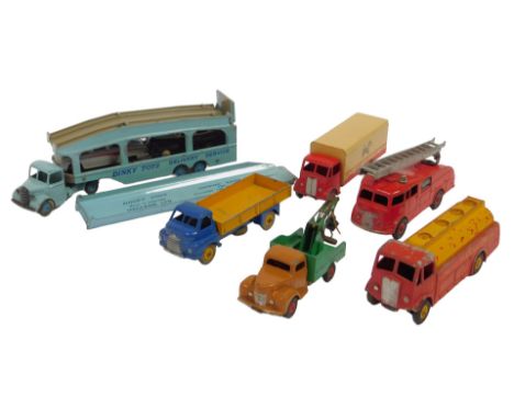 Dinky Toys diecast vehicles, including Big Bedford truck, fire engine, Pullmore Car Transport and Loading Ramp, Dinky Superto