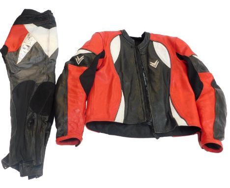 A Frank Thomas two piece set of motorcycle leathers, in red.